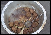 Cooking outside Yuting Flower and Bird Market. Beijing.