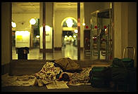 Travelers sleeping outside central train station in Stockholm (which is locked at night)