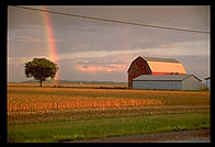 Rainbow and barn. Ontario, Canada.