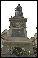 Smack in the center of the Campo de Fiori (Rome) is a statue of Giordano Bruno, philosopher.  Bruno held that God was present in nature and that the universe was infinite.  The Catholic Church burned him at the stake in 1600, right where his statue is today.