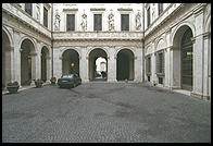 Palazzo Spada, near Rome's Campo de Fiori. This was built in 1540 for a cardinal and improved by Cardinal Bernardino Spara and his brother Virginio in the 17th century. They assembled a big art collection which is open to the public and hired Borromini to construct a clever gallery that appears longer than it is due to successively shortened columns.