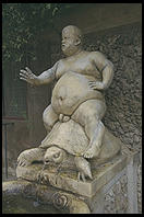 It may look like a fat guy riding a turtle, but it is actually art: Valerio Cioli's 1560 statue in Florence's Boboli Gardens. It shows Pietro Barbino, Cosimo I's court dwarf, as Bacchus.