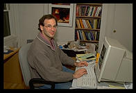 Philip sitting at his Windows NT box (photo: Rob Silvers)
