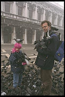 Father, Son, and Pigeons, an old combination in Venice's Piazza San Marco