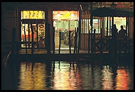 A pizza shop on the Grand Canal, near the Rialto Bridge.