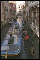 Two guys trying to get some work done; two tourists seeing Venice