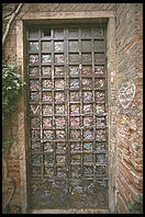 Lovers leave notes behind the statue of Shakespeare's Juliet, Verona.