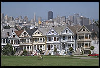 The Painted Ladies Victorian houses of Alamo Square, sometimes referred to as Postcard Row because of the backdrop of downtown skyscrapers.