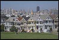 The Painted Ladies Victorian houses of Alamo Square, sometimes referred to as Postcard Row because of the backdrop of downtown skyscrapers.