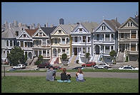 The Painted Ladies Victorian houses of Alamo Square, sometimes referred to as Postcard Row because of the backdrop of downtown skyscrapers.