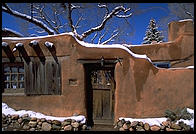 Adboe house and snow. Santa Fe, New Mexico