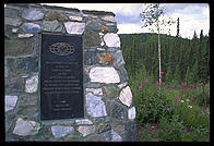 A stone monument erected by the Kiwanis International on the border between the US and Canada