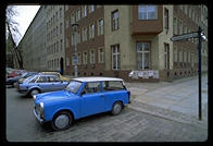 A Trabbi next to a Berlin street named after the town where V2 rockets were made