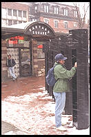 Winter phone call.  Harvard Square.
