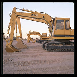 Backhoes.  Caterpillar Arizona Proving Grounds