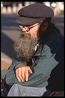 Protester outside the White House. Washington, D.C., shortly after Bill Clinton closed Pennsylvania Avenue to traffic by commoners. These guys have been protesting American militarism for 20 years, despite frequent arrests.
